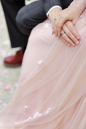 the hands of the newlyweds newlyweds hold hands weddingの写真素材
