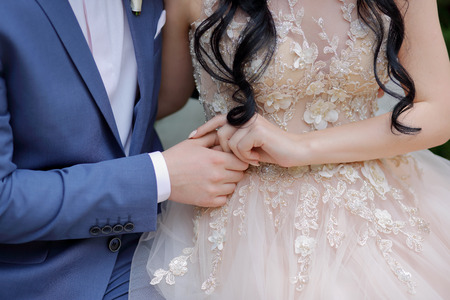 the hands of the newlyweds wedding theme holding hands newlywedsの写真素材