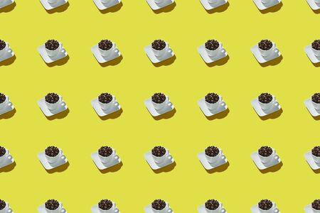 Seamless pattern cup of coffee on trendy yellow background, isometric style. Use for printing. View...