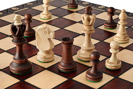 Chess. chessboard with figures made of woodの写真素材