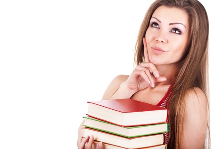 Portrait of a young woman with books isolatedの写真素材