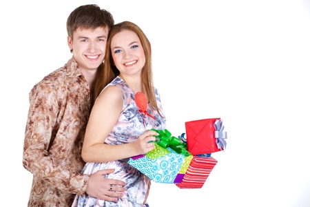young couple with giftsの写真素材