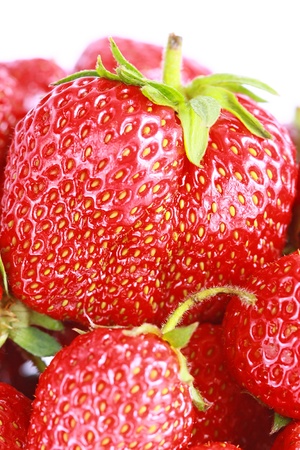a lot of Fresh red strawberries isolatedの写真素材