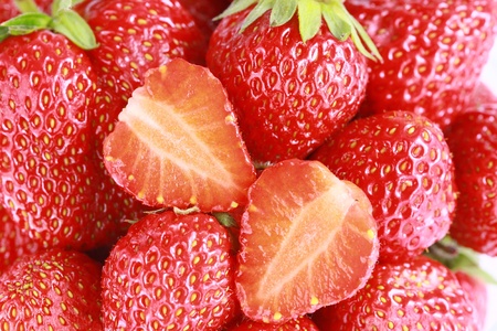 a lot of Fresh red strawberries isolatedの写真素材