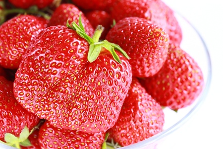 a lot of Fresh red strawberries isolatedの写真素材