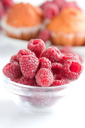 Bowl of raspberries close upの写真素材