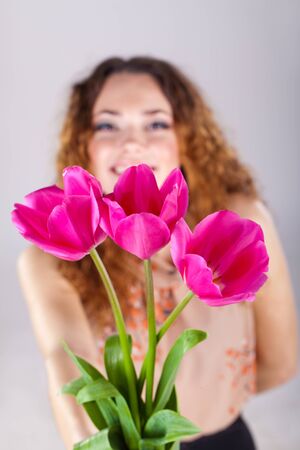 beautiful woman with flowersの写真素材