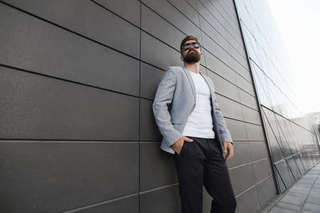 Portrait of a casual man with beard outdoorの写真素材