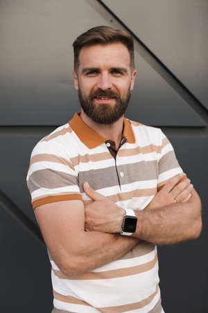 Portrait of a casual man with beard outdoor