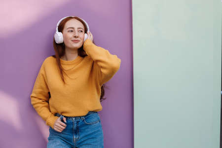 cute woman with headphones outdoor