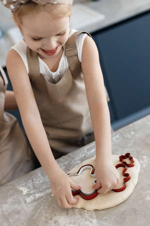 preschool little girl baking at home