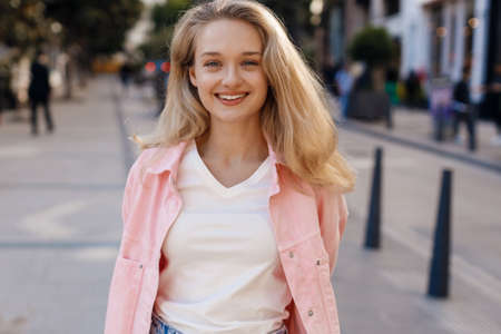young pretty blond woman outdoorの写真素材