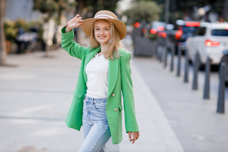 young pretty blond woman outdoorの写真素材
