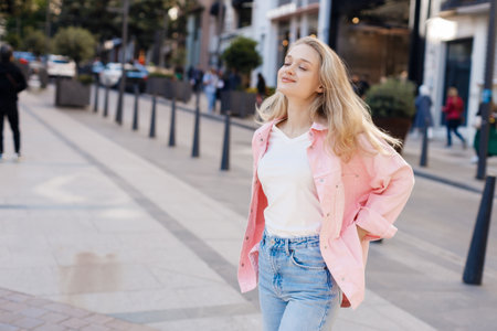young pretty blond woman portrait outdoorの写真素材