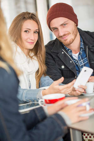 Young couple in coffe shop