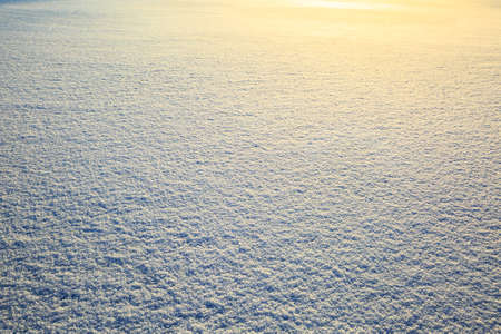 Winter landscape. Snow field sparkling in the sun, snow texture with glittering shine. Christmas natural background.の写真素材