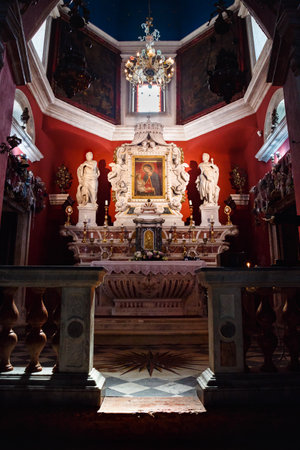 Virgin Mary icon into the Church of Our Lady of the Rocks in islet of the Kotor Bay near Perast, Montenegro. Interior of Catholic Church, architectural details and decoration.のeditorial素材