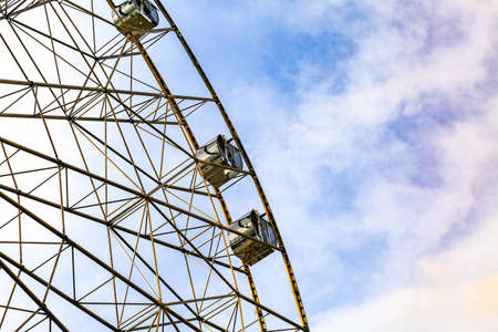 Ferris wheel on colorful sky background.の写真素材