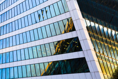 Skyscraper exterior design. Abstract view of a window, mirror reflection and detail. Modern office...