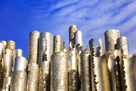 Hollow steel pipes welded together in wave-like pattern. Abstract concept art. Sibelius Monument in...