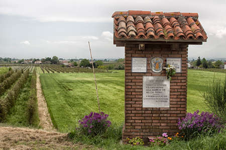 Votive monument to the Blessed Virgin Mary in the countryside near Cotignola in Italyのeditorial素材