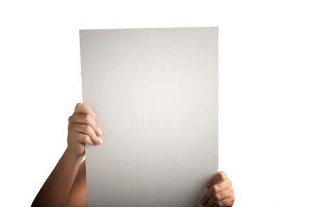 A light white plastic laminate square blank sign supported by young hands on light backgroundの写真素材
