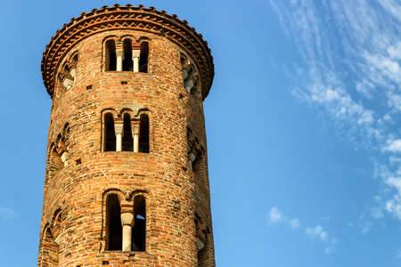 Cylindrical bell tower  (VIII-IX centuries) of countryside church of Campanile, located in the village of Santa Maria in Fabriago in Emilia Romagna region in northern Italyの写真素材