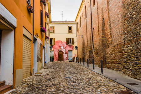 Steady works painted on the wall of the houses in the medieval small village of Dozza near Bologna in Emilia Romagna, Italyのeditorial素材