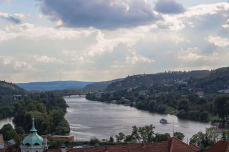 View of Prague from the Vltava river: house, trees, buildings and historical palacesの写真素材