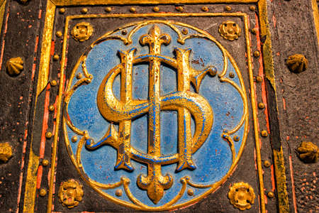 Entry door of the Basilica of St Peter and St Paul in Vysehrad in Prague: similare shape to dolar value symbolの写真素材