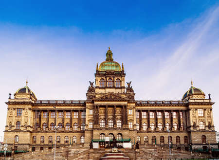 Buildings  and houses in the historical center of Prague. Wenceslas square in Prague in Central Europe: the equestrian statue of Saint Wenceslas and the Neorenaissance National Museumの写真素材