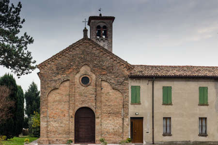 Brickwall facade of the XVI century church dedicated to The Ascension of Jesus Christ in the village of  Ascensione near Ravenna in the countryside of Emilia Romagna in Italy: it dates back to 1534の写真素材