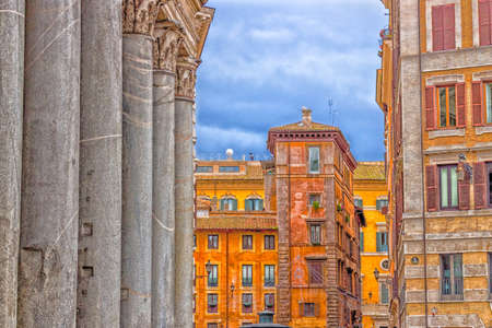 Windows of historical building and columns of Pantheon in the center of Romeの写真素材