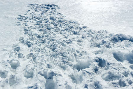 Trails on fresh snow on Dolomites Alpsの写真素材