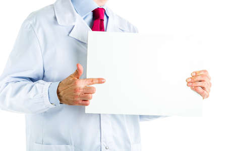 Caucasian male doctor dressed in white coat, blue shirt and red tie is showing a blank white...