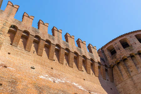 The deep sense of history points out this military fortification of 1400 in Northern Italy in Emilia Romagna, in the centre of the small old country village of Riolo Terme.の写真素材
