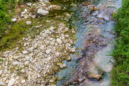 the waters of the stream Tramazzo  in the countryside in Northern Italyの写真素材
