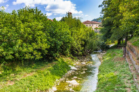 the waters of the stream Tramazzo while bathing the hill village of Tredozio in Romagna in the countryside in Northern Italyの写真素材