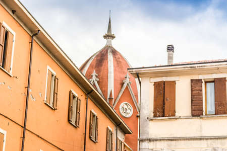 Grunge walls of ancient buildings of a country town in the Emilia Romagna region in Italyの写真素材