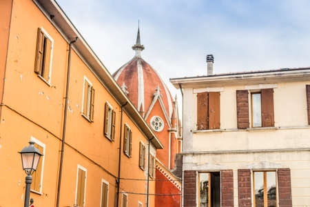 Grunge walls of ancient buildings of a country town in the Emilia Romagna region in Italy