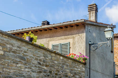 back in time and far from stress following the houses and streets of a typical small hill village in the countryside of Romagna in northern Italyのeditorial素材