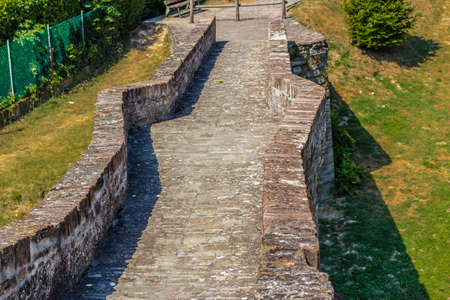 The humpback of bridge of San Donato in Modigliana in Italy reminds of old laborsの写真素材