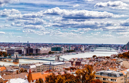 Panorama of the Danube river running through the ancient buildings of Budapestの写真素材