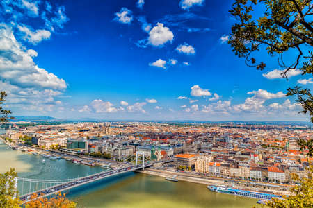 Panorama of the Danube river running through the ancient buildings of Budapestの写真素材