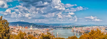 Panorama of the Danube river running through the ancient buildings of Budapestの写真素材