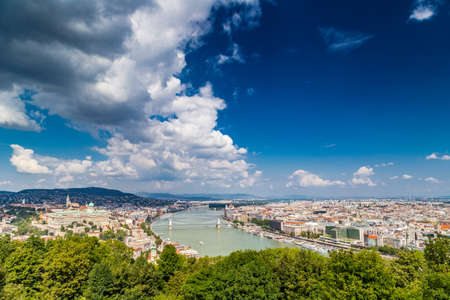 Panorama of the Danube river running through the ancient buildings of Budapestの写真素材