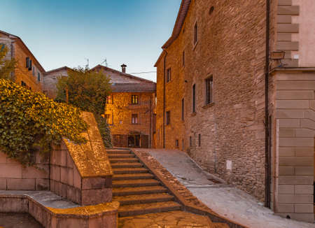 Alleys by night in medieval mountain village in Tuscany characterized by houses with walls of stones derived from the Renaissanceの写真素材