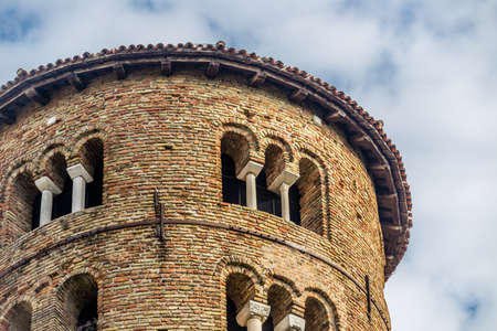 architecture details of cylindrical bell tower of the ninth century with mullioned windowsの写真素材