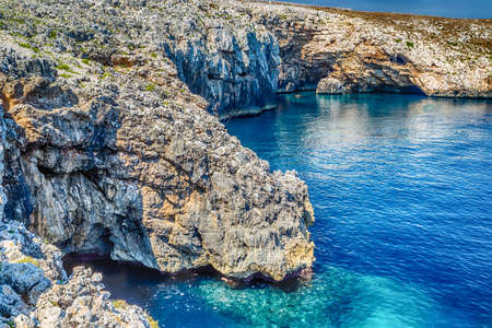 cove on the rocky beach near Otranto in Puglia, Italyの写真素材