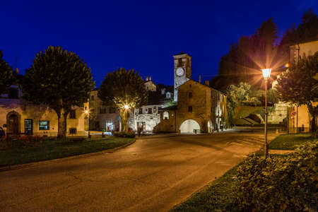 night view of The Palace of  the Captains in medieval mountain village in Tuscany characterized by houses with walls of stones derived from the Renaissanceの写真素材